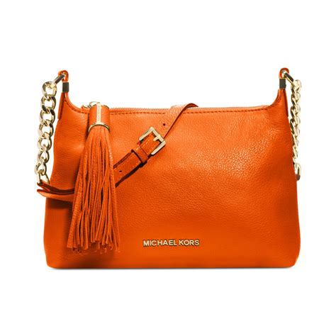 michael kors overlap messenger leder orange|MICHAEL Michael Kors Orange Handbags + FREE SHIPPING.